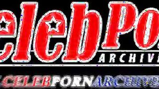 Game Blonde Wearing 2-Piece Plays On Beach