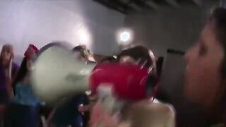 Lubed up pledgers wrestle and lick pussy