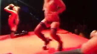 Sexy threesome action on the stage at sex show event
