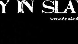 Slaves offered to master in a filthy dark room bound in cuffs and with tit bondage clips