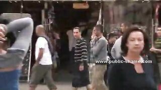 Curly sexy brunette on high heels and with very short skirt served in public sex