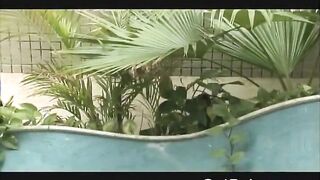 Busty butt naked girl sticking a massive white cock in her hairy pussy