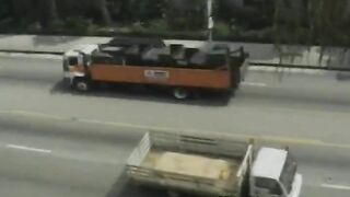 Blonde domina in black stockings and high heels bangs a guy with a strapon