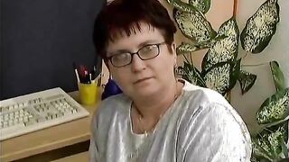 A younger guy catches his mature female coworker cheating with the hours. With this in mind this guy demands the woman to get naked and masturbate right in front of him. Afetr a little rubbing her shaved pussy some naughty dildo action takes place in the 