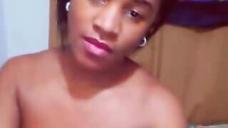 Beautiful black babe presents her big tits