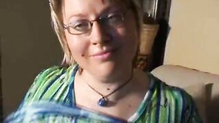 Mature woman rubs big tits