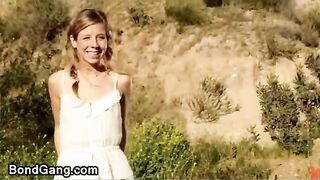 Hairy blonde tied up and orgy fucked outdoors