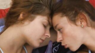 sapphic babes undressing each other