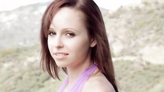 Redhead model teasing outdoors