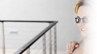 Leila models blue dreams on balcony