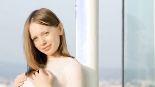 Top slim chick on the balcony