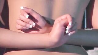 Asian girl is tied in ropes as master