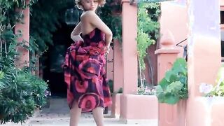 Exotic coed stripping and dancing