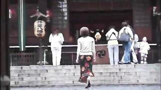 Cute brunette Asian chick shows her tits