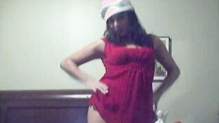 SANTA'S STRIP-TEASING LATINA