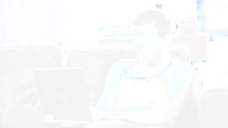 attractive blonde on the black couch