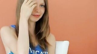 cunt opening and smiling for a camera