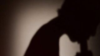 Blondie posing with her strap on