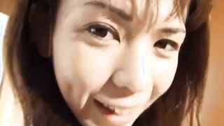 Smiling Japanese asian girl enjoys sex
