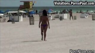 Tits exposed on beach