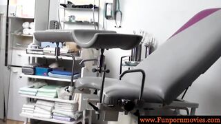 Latex nurses in gynecologist chair