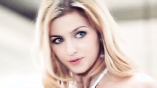 sweet blonde on the black sofa