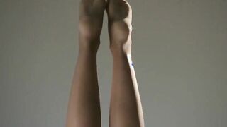 fluent babe in nylon jerking off strapon