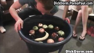 Blond girl watching guys give head