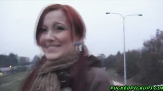 Redhaired babe Belinda in a public bridge