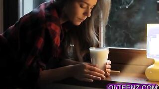 Sexy teen brunette plays with milk