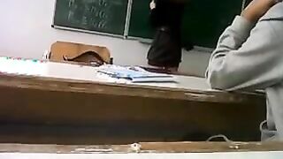 Teacher legs and upskirt in class room