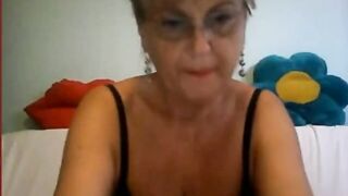 Big tits granny in glass  masturbating on cam