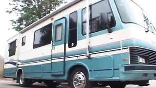 Voluptuous redhead in action on the couch