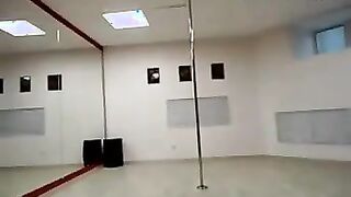 Cam Girl Practices Pole Dancing