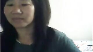 Mature Asian Shows Her Tits