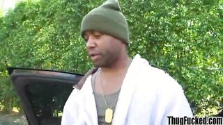 Black thug gives outdoor blowjob to a big cock