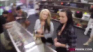 Lesbian couple gets their tasty pussy banged hard by the shop owner