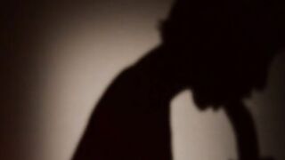 Blondie undressing with her strap on