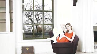 Skinny vagina teasing on the armchair