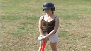 Cute teen Kitty playing baseball outdoors