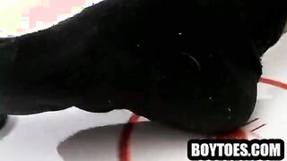 Stud tugs on his cock and plays air hockey with his feet