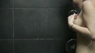 Brunette babe strip cunt in a shower