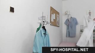 Pale skin redhead clinic spy cam video
