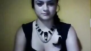 Cute Latina girl teases on webcam