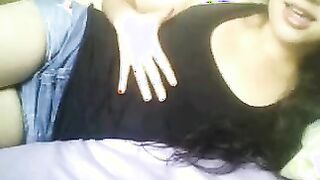 European teen teases with small tits on her live cam