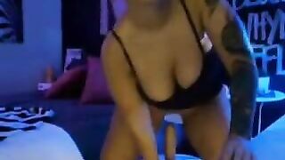 Goth Brunette Chick Rides and Sucks A Dildo On Cam