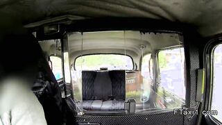 Busty British babe gives titsjob in taxi