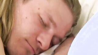 Hunk on bed turns another man on