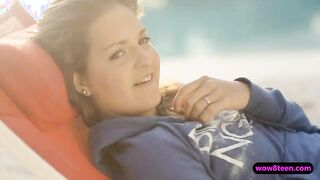 Sweet brunette teen Dominique fingering her pussy outdoors