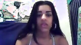 Latin Girl Strips And Masturbates